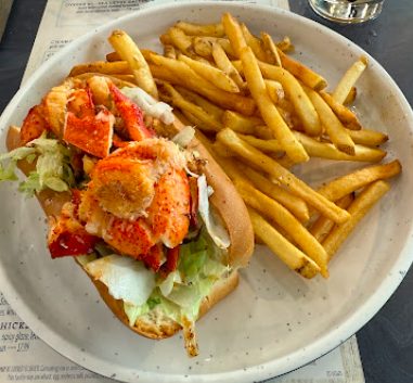 The Waterman Fish Bar at Charlotte Douglas International Airport signature dishes Lobster Roll
Shrimp Tacos
Low Country Shrimp & Grits